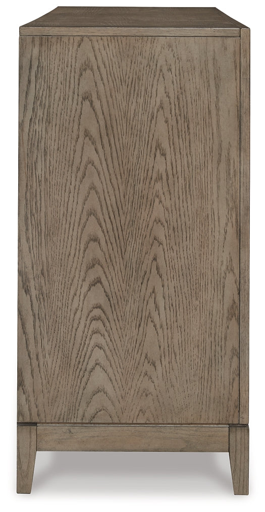 Chrestner Dining Table and 8 Chairs with Storage Signature Design by Ashley®