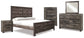 Wynnlow King Crossbuck Panel Bed with Mirrored Dresser, Chest and Nightstand Signature Design by Ashley®