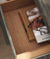 Wynnlow King Crossbuck Panel Bed with Mirrored Dresser, Chest and Nightstand Signature Design by Ashley®
