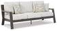 Tropicava Outdoor Sofa and Lounge Chair with Coffee Table and 2 End Tables Signature Design by Ashley®
