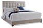 Dolante Queen Upholstered Bed with Mattress Sierra Sleep® by Ashley
