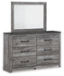 Bronyan Queen Panel Bed with Mirrored Dresser and 2 Nightstands Signature Design by Ashley®