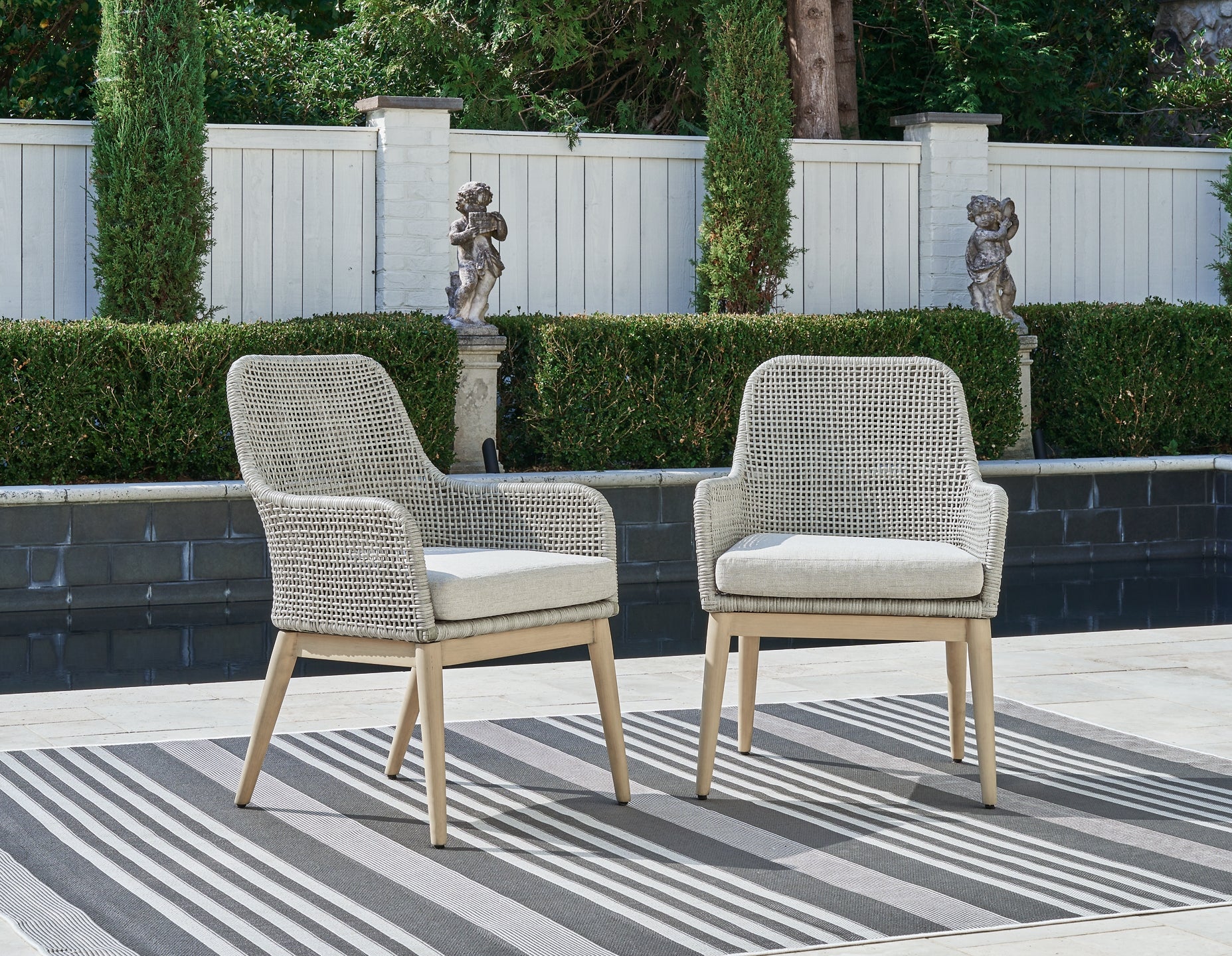Seton Creek Arm Chair With Cushion (2/CN) Signature Design by Ashley®