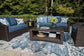 Windglow Rectangular Cocktail Table Signature Design by Ashley®