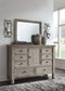 Harrastone California King Panel Bed with Mirrored Dresser Millennium® by Ashley
