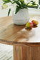 Dressonni Round Dining Room Table Signature Design by Ashley®